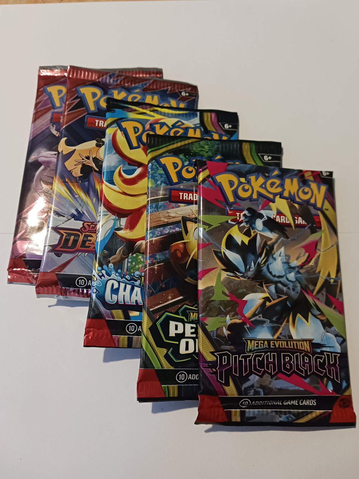 Pokémon TCG Mega Evolution kits containing five packs